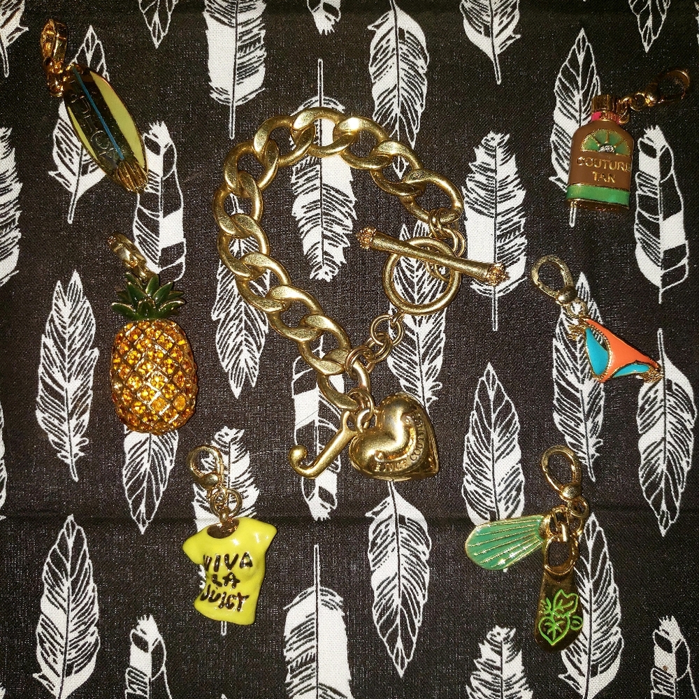 Juicy Couture gold charm braclet with RARE charms